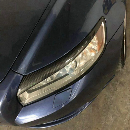Karbonlook frontlykt-øyelokk (eyebrow trim) for Volvo S40/V50 (2004–2012)